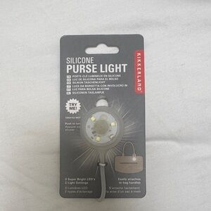 Kikkerland Black Silicone Purse Light LED Keychain
